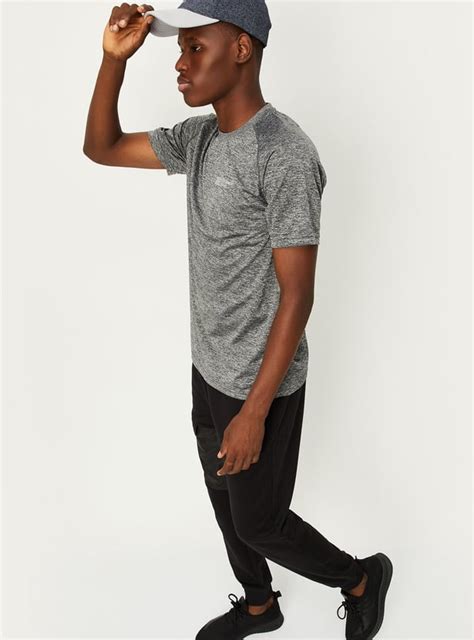 Buy Men Textured Slim Fit Sports T-shirt Online at just Rs. 399.0 ...