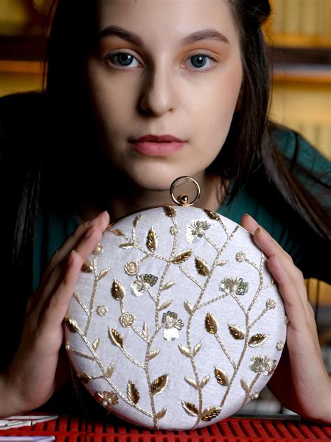 Buy White Pretty Round Adorning Clutch! Online. – Odette