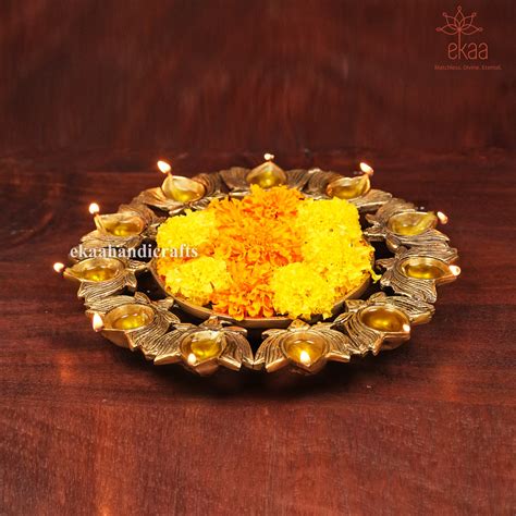 Brass Urli Bowl with Lotus Diya's – Ekaa Handicrafts