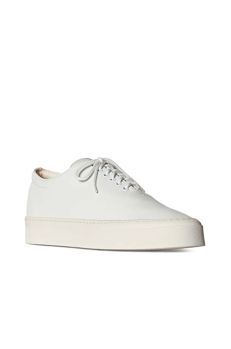The Row Marie H Lace Up Leather Sneakers in Snow | FWRD