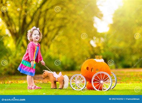 Little Girl Playing Princess at Pumpkin Patch Stock Photo - Image of ...
