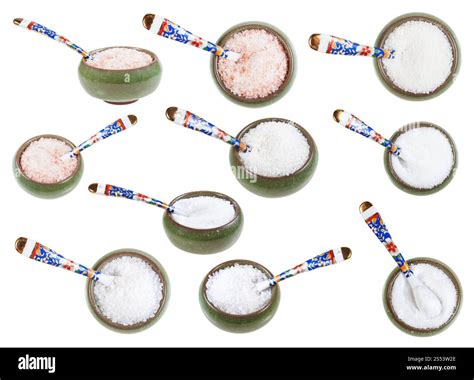 set from ceramic salt cellar with spoon with various salts isolated on white background Stock ...