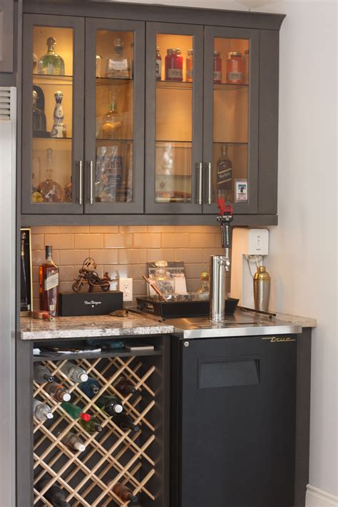 Custom wine rack in bar area with Kegerator and glass door liquor ...