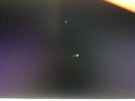 Faint white spots on new laptop screen : r/laptops