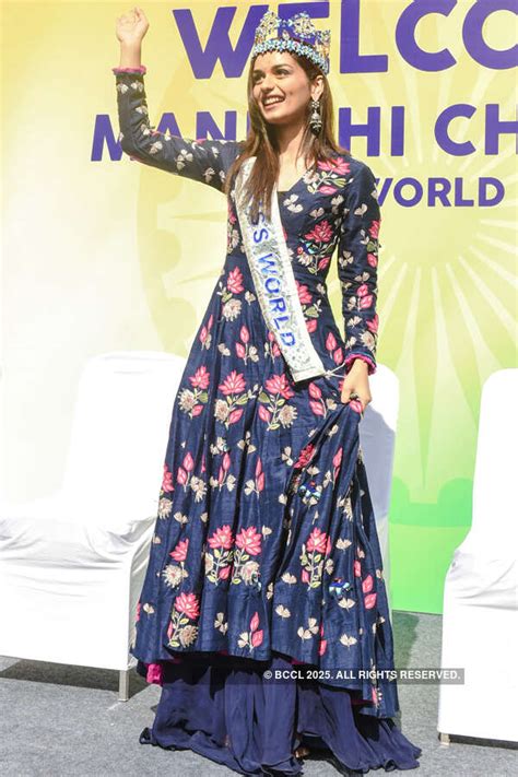 Manushi Chhillar waves at the crowd while she visits a BMC school in ...