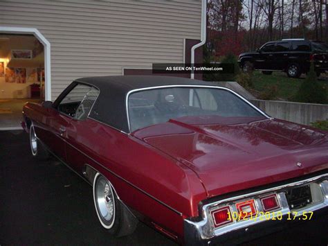 1973 Chevy Impala Custom. . Burgundy With Black Vinyl Roof.
