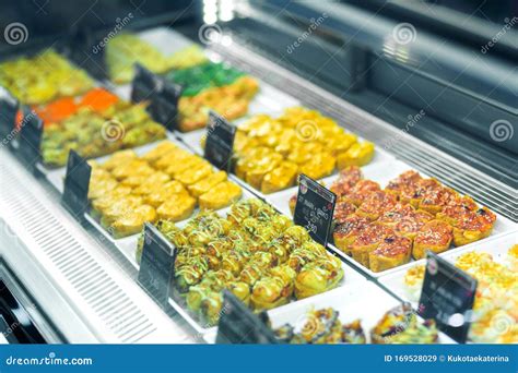 Showcases with a Beautiful Layout of Chinese Food. Food Court in the ...