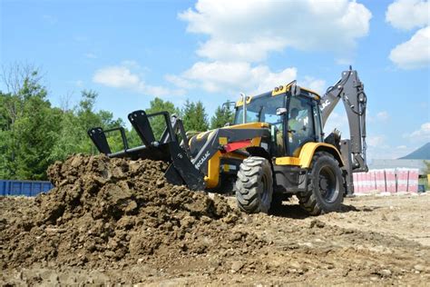 Image result for Backhoe Loading Logs