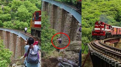 Rajasthan : పట్టాలపై రీలు చేస్తుండగా రైలు | Rajsamand Husband Wife ...