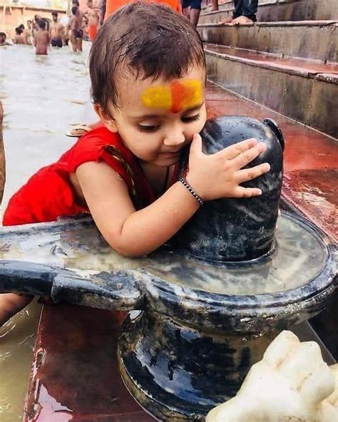 Iat a particle of mass m at rest decays into two particles of masses m ...