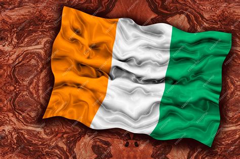 Premium Photo | National flag of Cote d'Ivoire Background with flag of ...