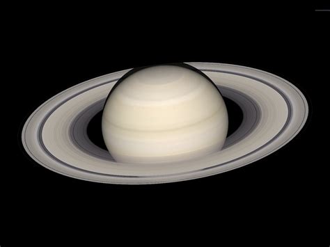 Crescent Saturn and Titan seen by Cassini – Astronomy Now