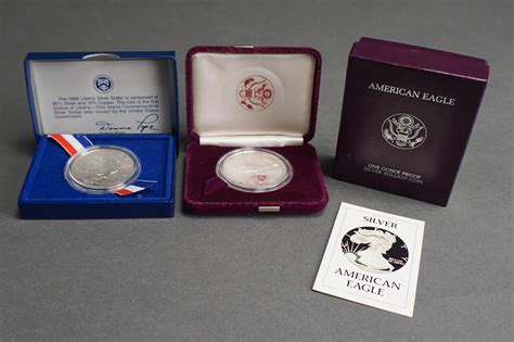 Lot - U.S. 1986 Silver Liberty Dollar and an American Eagle One Ounce ...