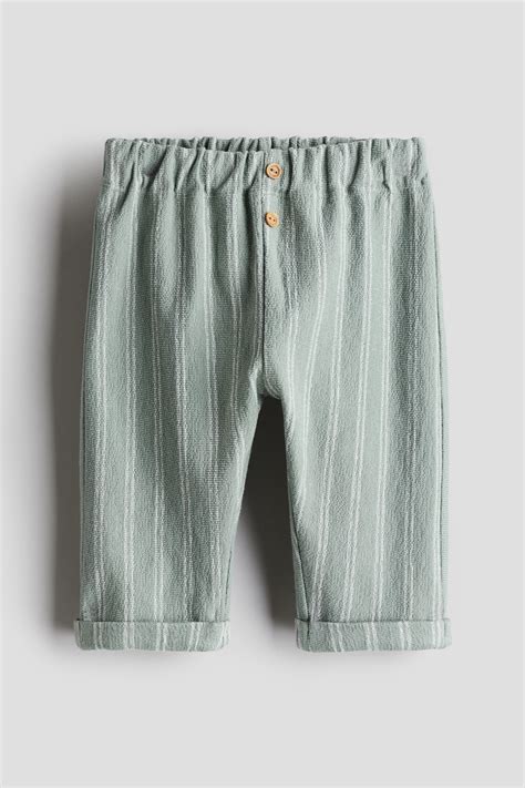 Dusty green Cotton terry joggers for kids | H&M IN