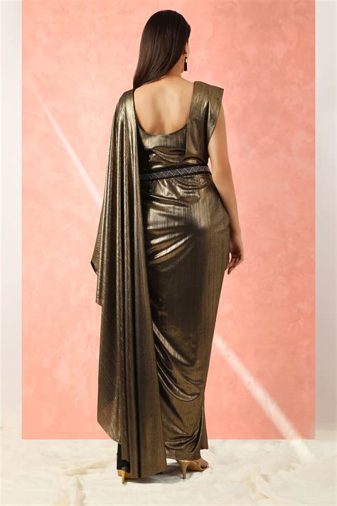 Gold metallic shimmer draped saree gown. – Sionnah