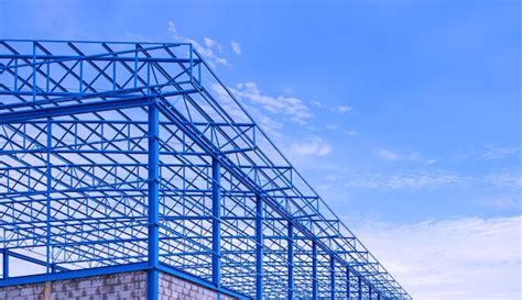 Blue metal roof beam and columns of new industrial building structure ...