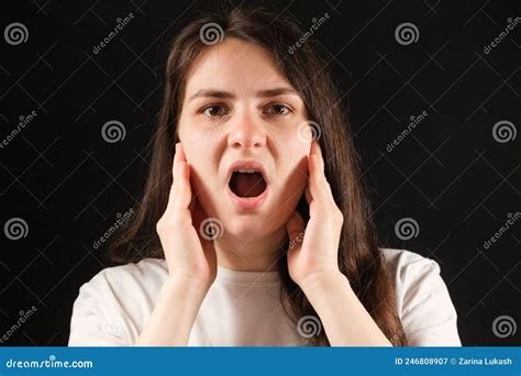 A Woman with an Open Mouth Holds Her Cheeks with Her Hands, Exercises for Dysfunction of the ...
