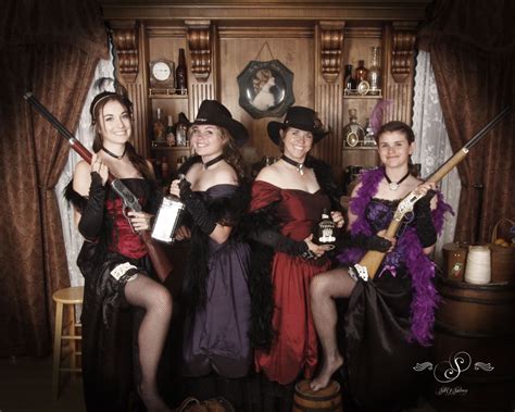 These saloon girls and cow girls are pretty in purple and red! Family ...