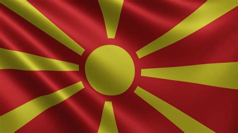 The flag of North Macedonia is fluttering in the wind close-up, the ...