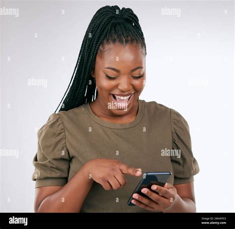 Watching phone laughing hi-res stock photography and images - Alamy