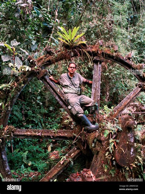 PANAMA, Cana, a scientist sits in an old gear that was part of a gold ...
