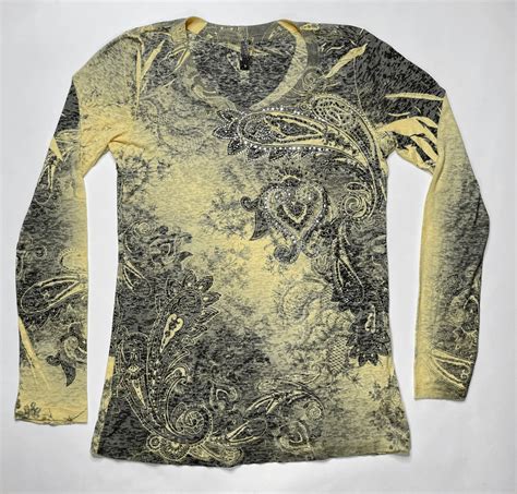 Does anyone know this brand? No RN number, can't make out the letters ...