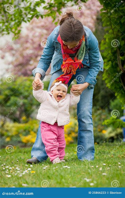 Baby s first steps stock image. Image of baby, flowers - 25866223