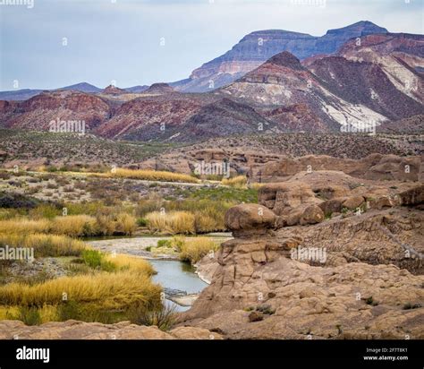 Mountain ranges looming over the Rio Grande in Big Bend National Park ...