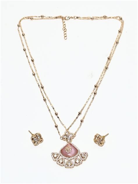 Odette Golden Alloy Kundan And Stone Jewellery Set For Women