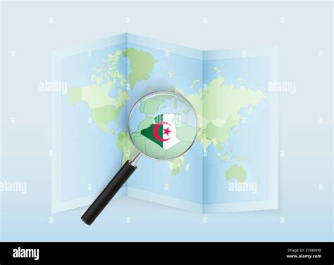 A folded world map with a magnifying lens pointing towards Algeria. Map and flag of Italy in ...