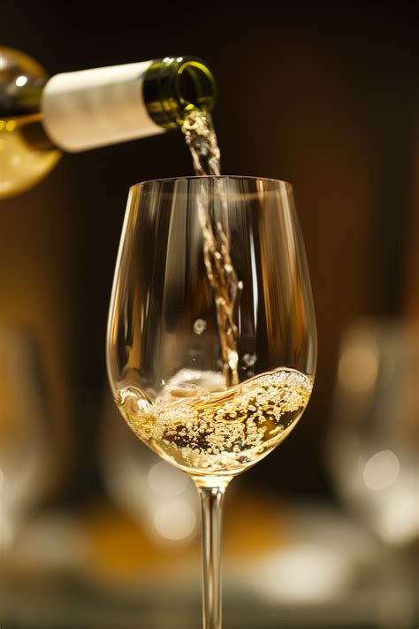 White wine poured in glass, a Food & Drink Photo by MistyDay | White ...