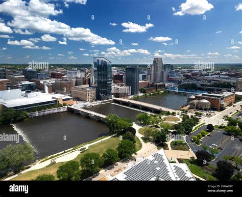 Summer aerial skyline view of the Grand River in downtown Grand Rapids ...