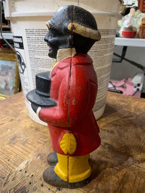 Uncle Moses 12 inch tall cast iron bank . How much is this worth : r ...