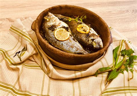 Gilt-head bream, delicious fish in clay pot by Greek Goes Keto