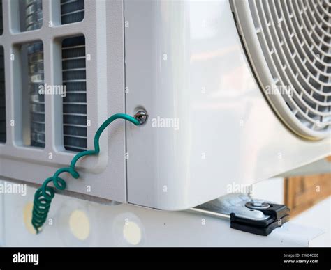 Air conditioning compressor outdoor unit with Electrical ground wire ...