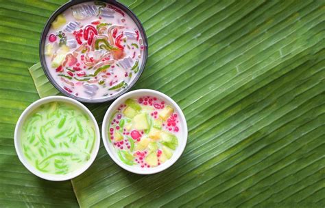 Thai dessert - Thai rice flour pandan leaf cantaloupe jelly mixed fruit with coconut milk and ...