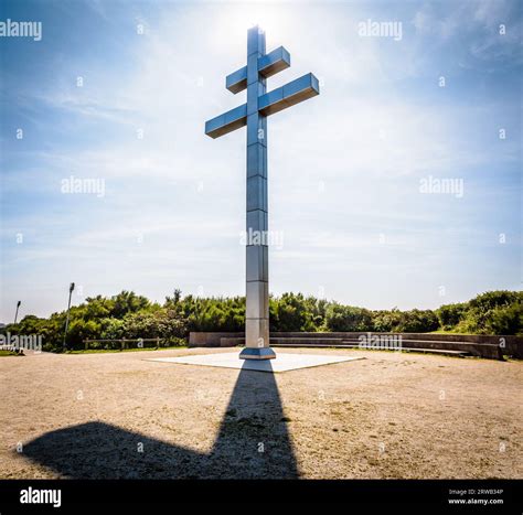 Backlit view of the large cross of Lorraine erected in 1990 on Juno ...