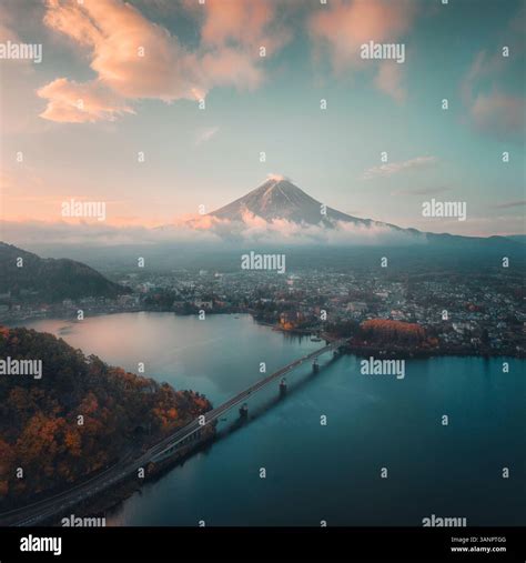 Aerial view of tranquil Lake Kawaguchi with Mount Fuji in sunset and a ...