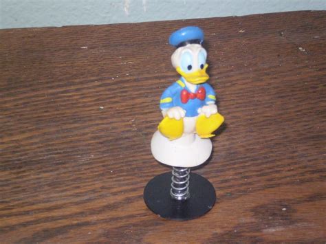 Image result for Spring Loaded Popup Compartment