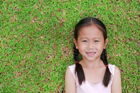 Portrait of beautiful little asian child girl with two ponytail hair ...