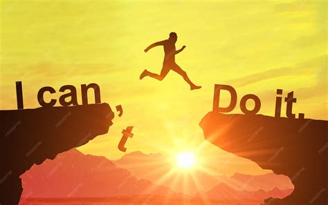Premium Photo | Silhouette of man jumping and change i can't do it to i can do it text on ...