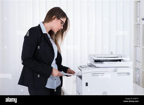 Woman Using Copy Machine 的图像结果