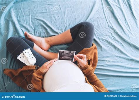 Pregnant Woman Holding Ultrasound Image Stock Photo - Image of mother ...