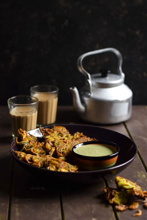 Hot onion pakoras along with a cup of masala tea is all that you need ...