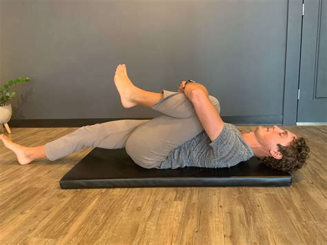 Knee To Chest Position at Carolyn Redington blog