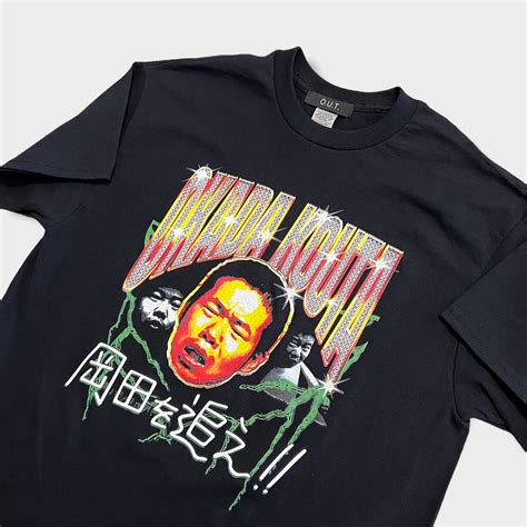 岡田を追え!! × O.U.T. S/S Tee | O.U.T.Tokyo