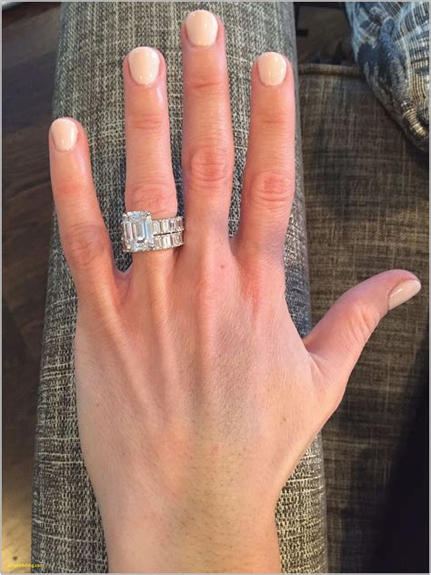 emerald cut engagement ring with eternity band