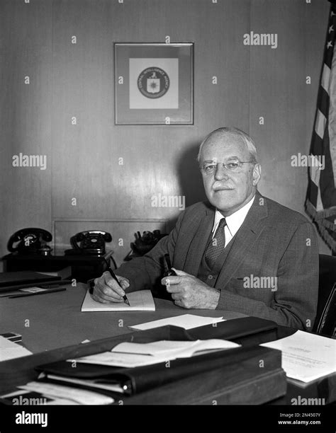 Allen W. Dulles, director of the Central Intelligence Agency, poses in ...