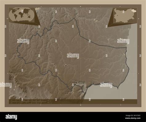 Dobrich, province of Bulgaria. Elevation map colored in sepia tones with lakes and rivers ...