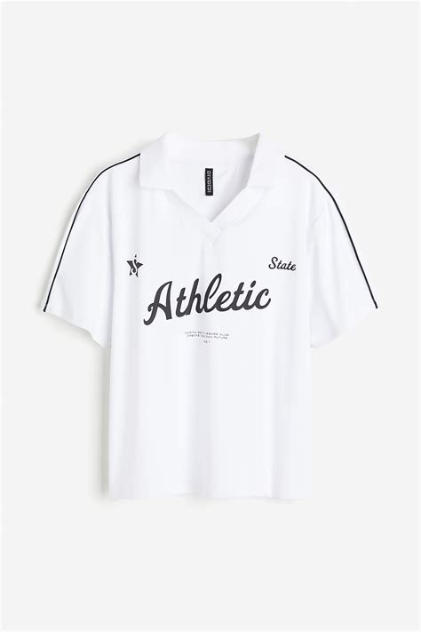 Printed polo shirt - White/Athletic - Ladies | H&M IN